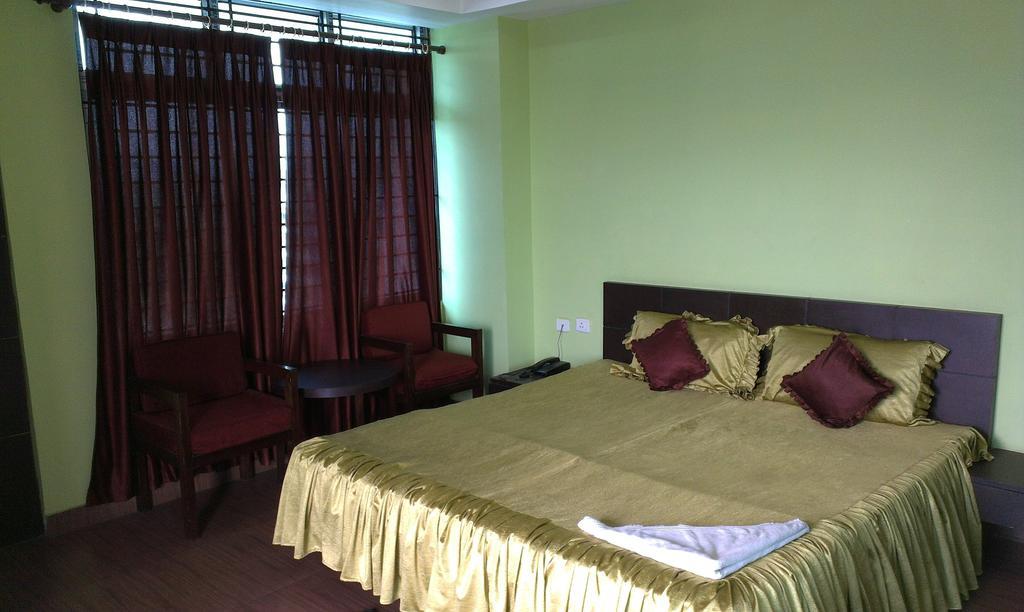 Hotel Sun View Dispur Quarto foto